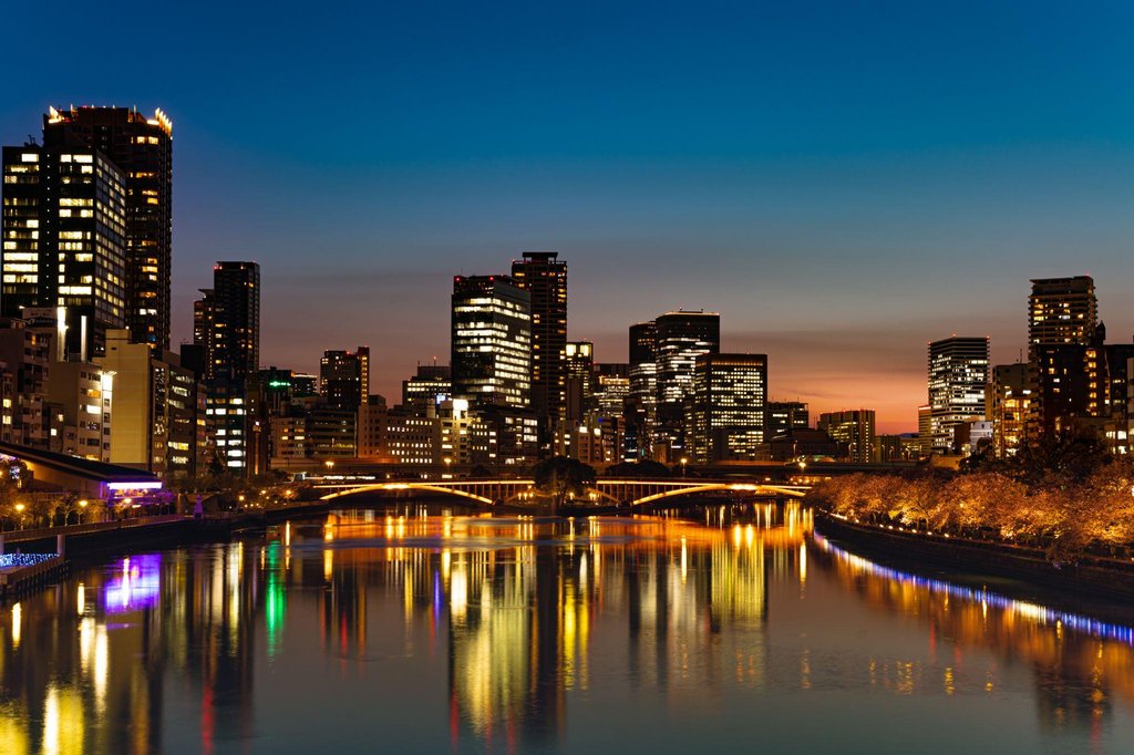 Neon-lit bar district in Osaka at night