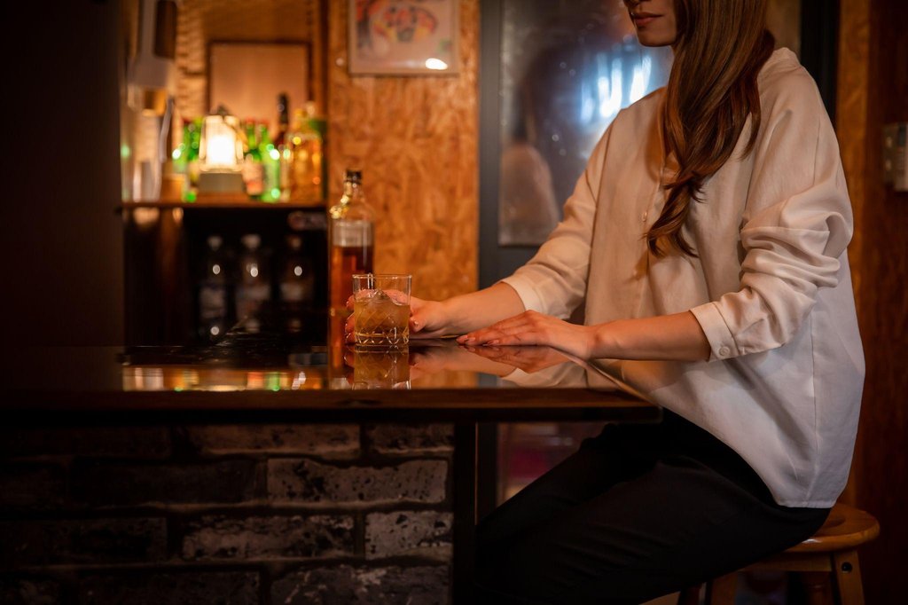 Solo traveler enjoying bar in Osaka