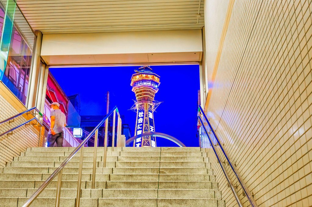 Tourist exploring retro shops in Shinsekai