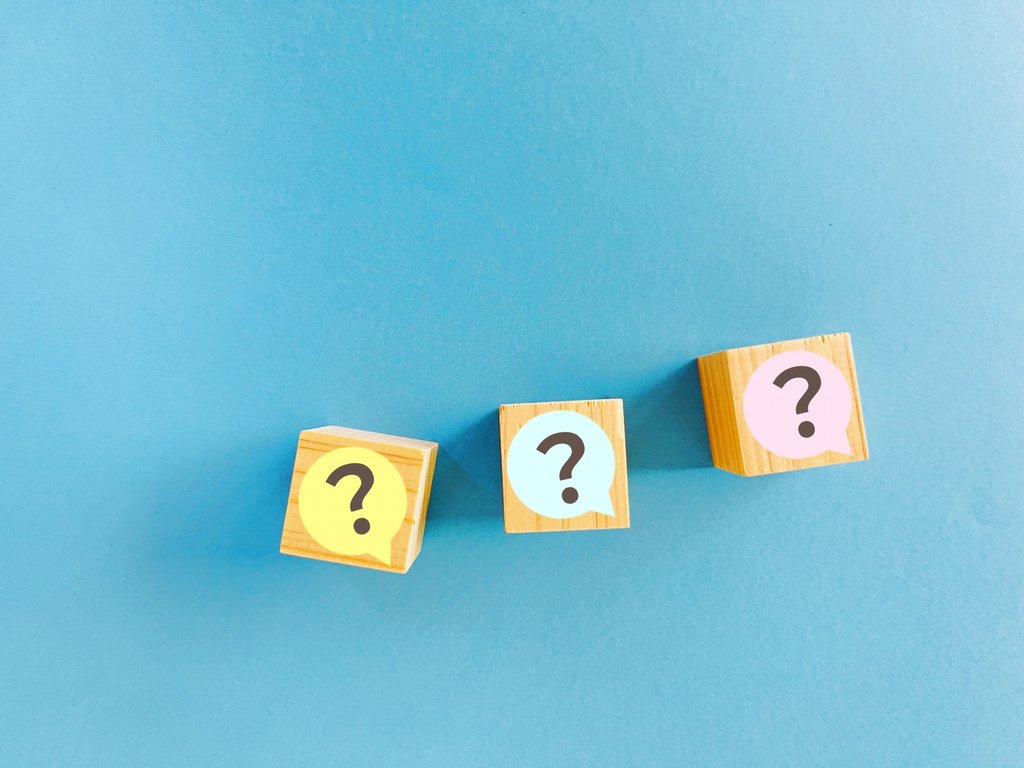 Travelers checking rail pass and tickets at station