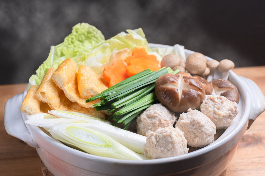 Steaming chanko-nabe hot pot with ingredients