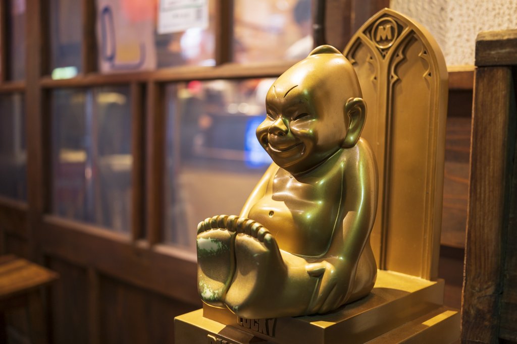 Billiken statue at Tsutenkaku Tower