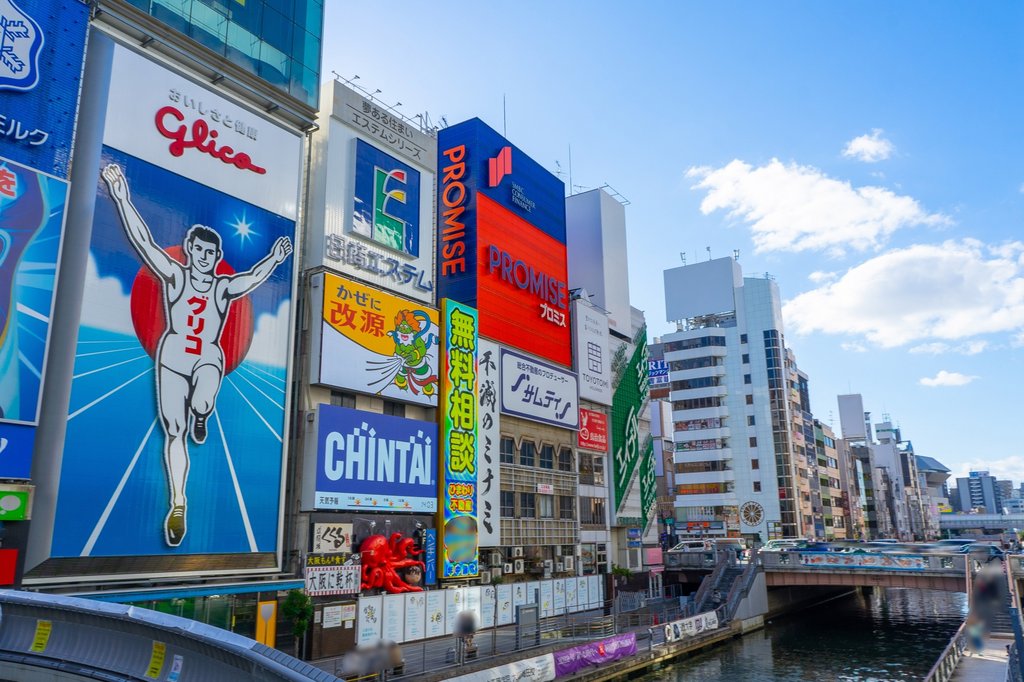 Dotonbori canal with Glico Running Man sign in Osaka