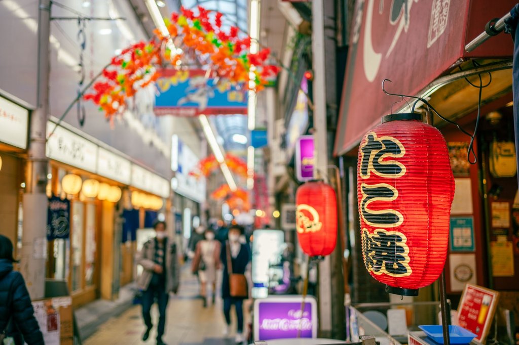 Tsutenkaku Tower and Jan Jan Yokocho street in Shinsekai