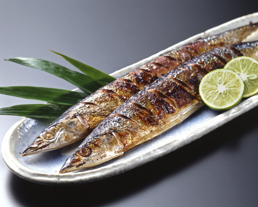 Autumn ingredients matsutake mushrooms and Pacific saury