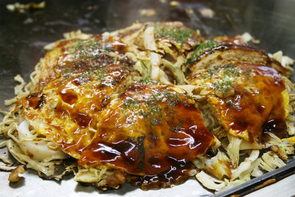 Popular Osaka food dishes displayed on table