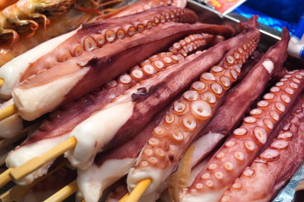Grilled seafood skewers at Kuromon Market