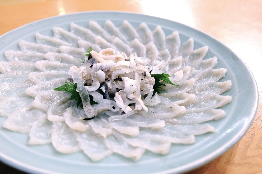 Fugu sashimi prepared at Kuromon Market