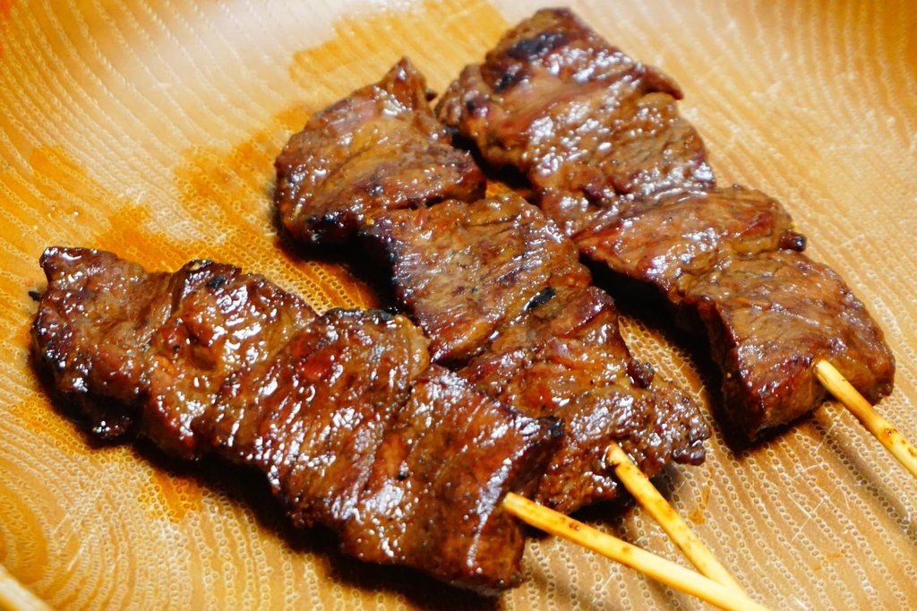 A5 wagyu beef skewers grilling