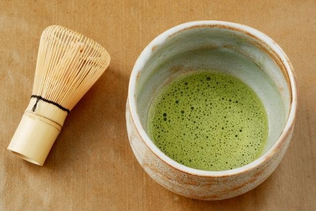 Tea ceremony instructor demonstrating otemae preparation
