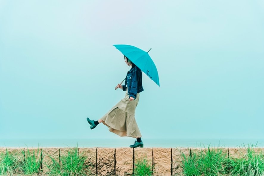 Rainy day osaka food tour with umbrella