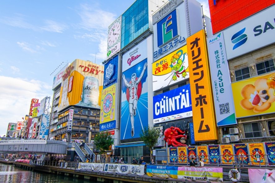 Modern shopping district in Osaka with crowds