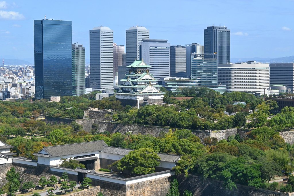 Osaka Castle Main Tower with stone walls and moat