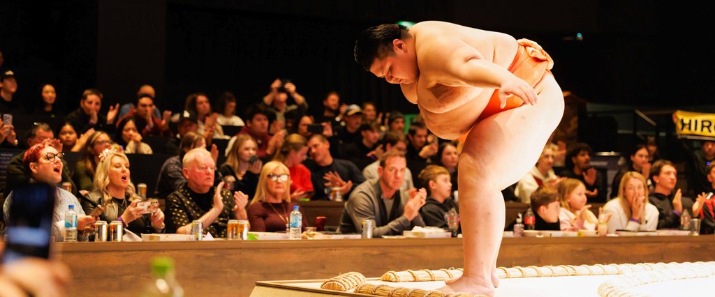 Sumo wrestlers performing at THE SUMO HALL HIRAKUZA OSAKA