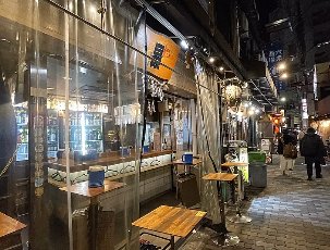 Sake bottles at Tachinomi Sai